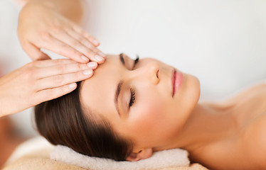 Image showing beautiful woman in spa salon having facial