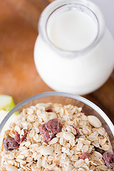 Image showing close up of bowl with granola or muesli on table