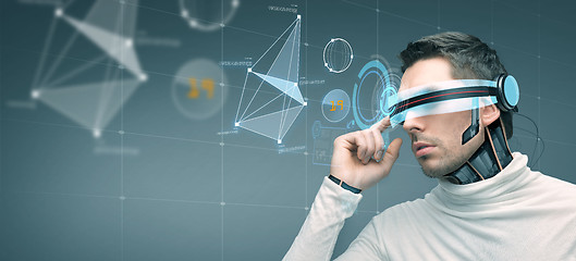 Image showing man with futuristic 3d glasses and sensors