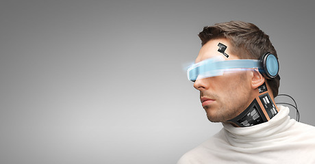 Image showing man with futuristic glasses and sensors