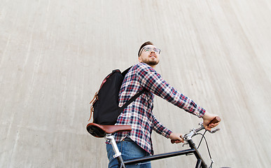 Image showing hipster man with fixed gear bike and backpack