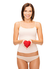 Image showing beautiful woman in cotton underwear and red heart