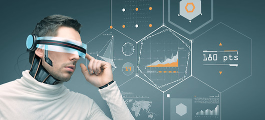 Image showing man with futuristic 3d glasses and sensors