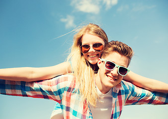 Image showing smiling couple having fun outdoors