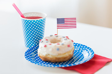 Image showing donut with juice and american flag decoration