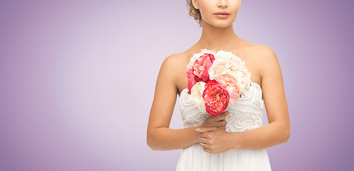 Image showing bride or woman with bouquet of flowers