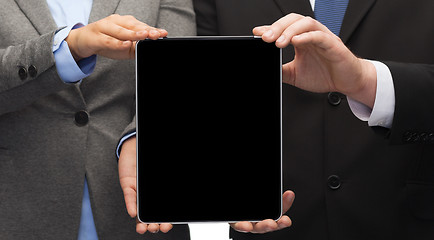 Image showing businessman and businesswoman with tablet pc