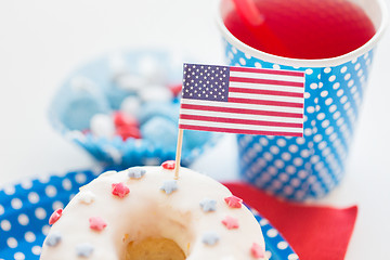 Image showing donut with juice and candies on independence day