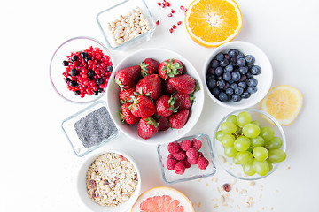 Image showing close up of fruits and berries in bowl on table