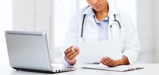 Image showing female doctor with laptop pc