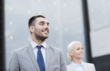 Image showing close up of smiling businessmen