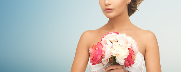 Image showing bride or woman with bouquet of flowers