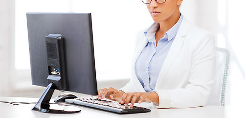 Image showing african businesswoman with computer in office