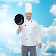 Image showing happy male chef cook holding frying pan