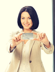 Image showing happy woman with credit card