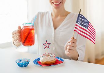 Image showing happy woman celebrating american independence day