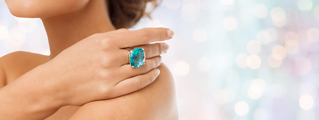 Image showing close up of woman with cocktail ring on hand