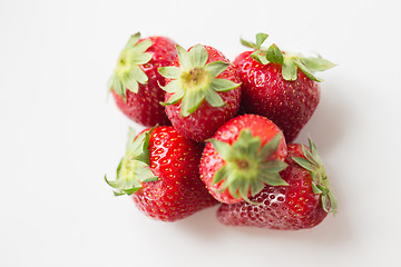 Image showing juicy fresh ripe red strawberries on white