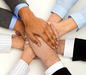 Image showing group of businesspeople celebrating victory