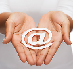 Image showing womans cupped hands showing e-mail cutout sign