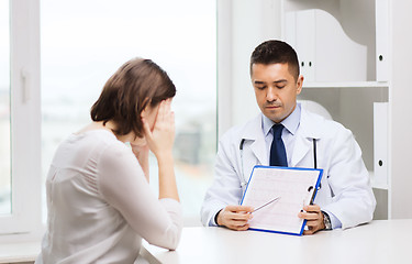 Image showing doctor and young woman meeting at hospital