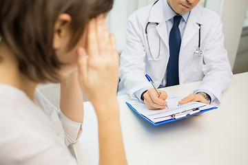 Image showing close up of doctor and woman meeting at hospital