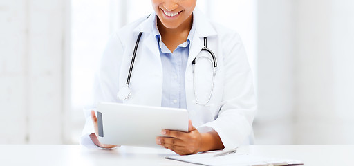 Image showing african female doctor with tablet pc