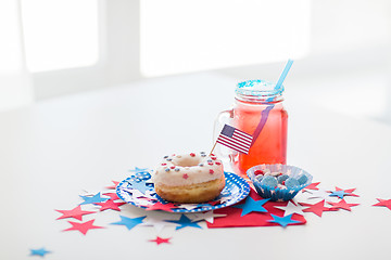 Image showing donut with juice and candies on independence day