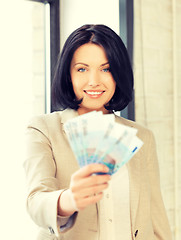 Image showing lovely woman with euro cash money