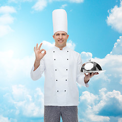 Image showing happy male chef cook with cloche showing ok sign