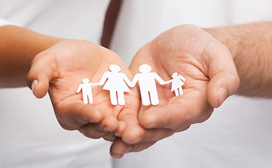 Image showing couple hands with paper man family