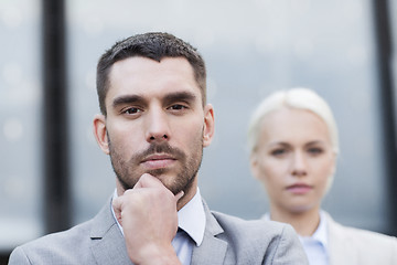 Image showing businessman and businesswoman outdoors