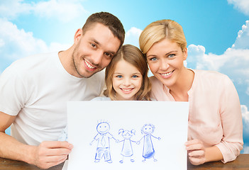 Image showing happy family with drawing or picture