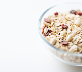 Image showing close up of bowl with granola or muesli on table