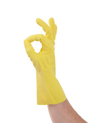 Image showing Hand gesturing with yellow cleaning product glove