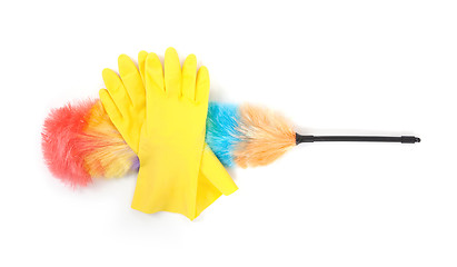 Image showing Yellow cleaning gloves with a duster