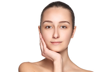 Image showing Portrait of beautiful girl stroking her face with healthy skin 