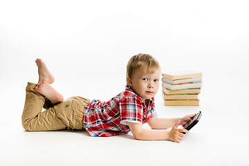 Image showing boy with a Tablet PC. studio