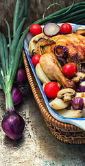 Image showing baked whole chicken in vegetables
