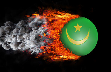 Image showing Flag with a trail of fire and smoke - Mauritania