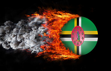 Image showing Flag with a trail of fire and smoke - Dominica