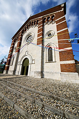 Image showing  church    the varano borghi  old   closed brick tower sidewalk 