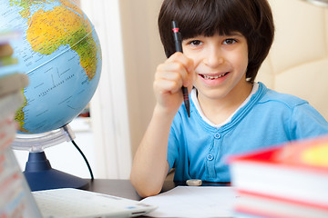 Image showing schoolboy doing homework