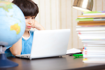 Image showing schoolboy doing homework