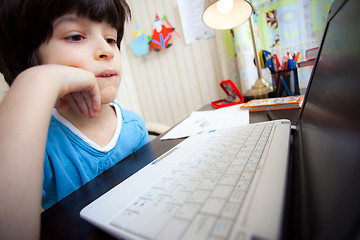 Image showing distance learning, a boy with computer