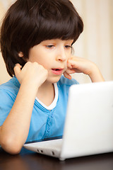 Image showing boy with white notebook