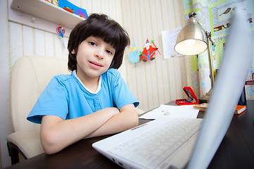 Image showing schoolboy doing homework