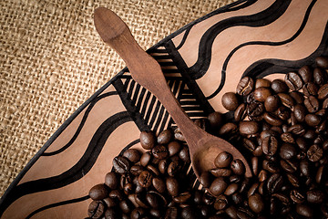 Image showing pile of fresh and bio aromatic coffee beans and spoon