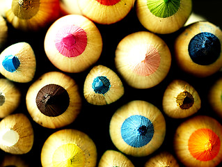 Image showing Colorful wooden crayons closely.