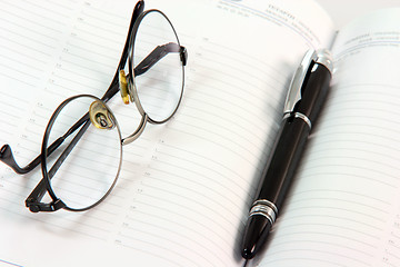 Image showing diary and spectacles